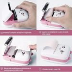 Mini cat printer being loaded with paper.